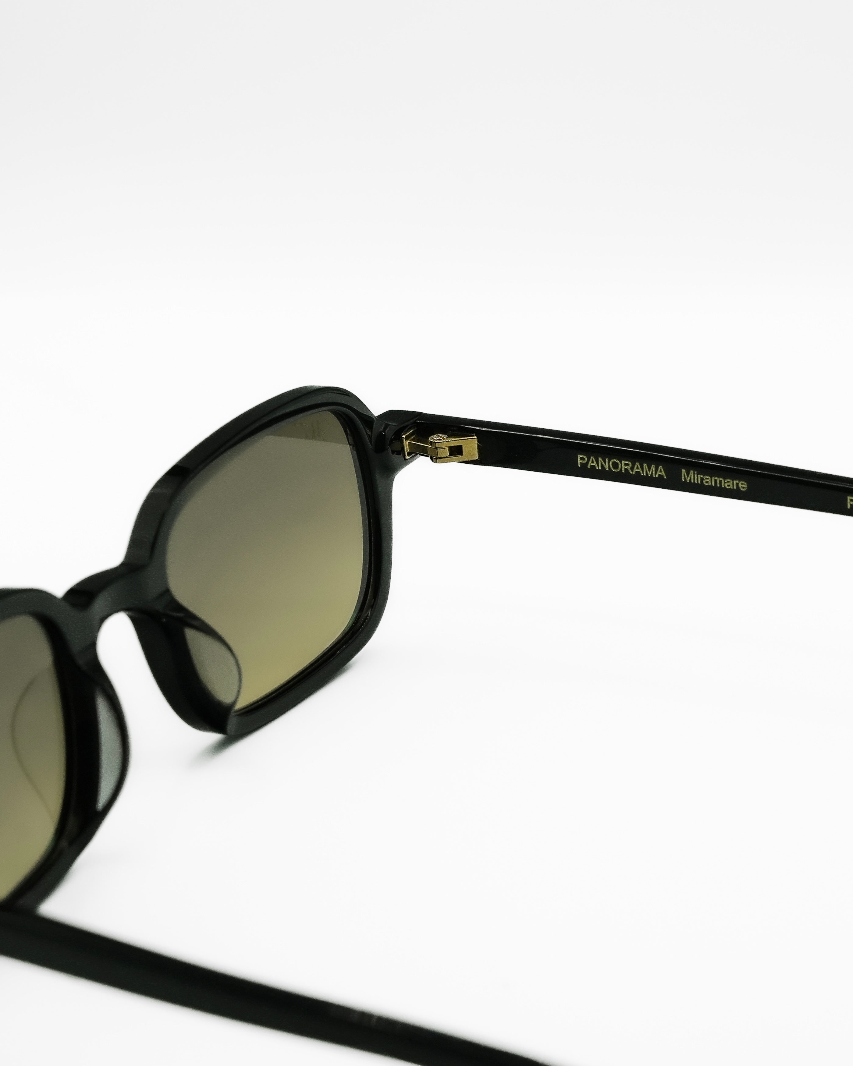 SWT Miramare rectangular sunglasses in black acetate with green to yellow gradient lens, side view