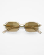 Vesper sunglasses by SWT, transparent amber frame with brown gradient lenses, front view
