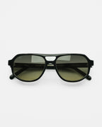 Sundown sunglasses by SWT, black aviator frame with green to yellow gradient lenses, front view