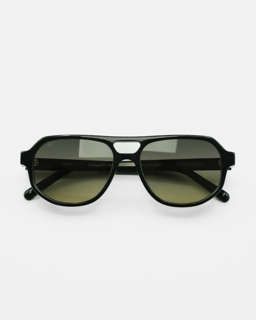 Sundown sunglasses by SWT, black aviator frame with green to yellow gradient lenses, front view
