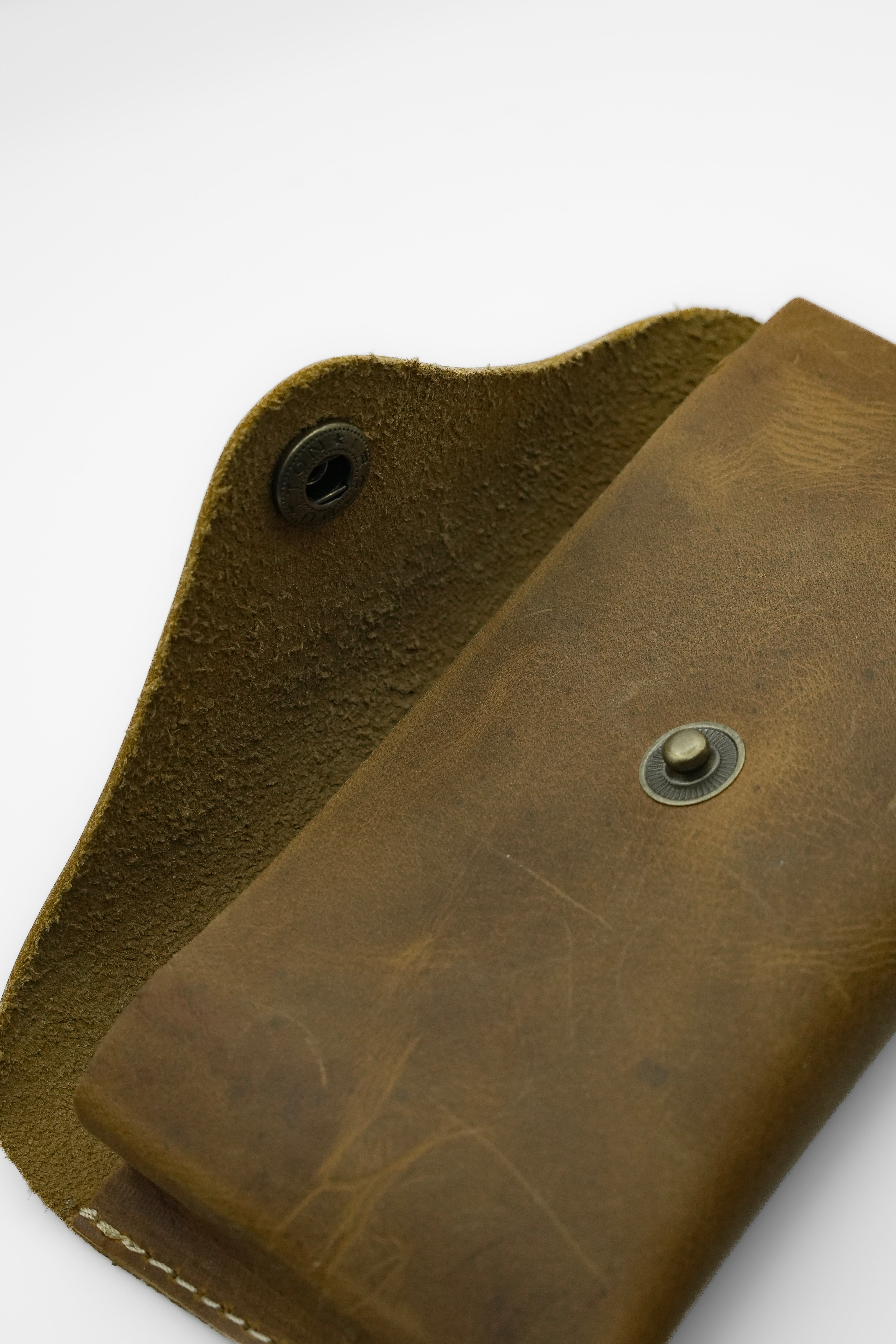 SWT brown leather sunglasses case, solid brass snap detail