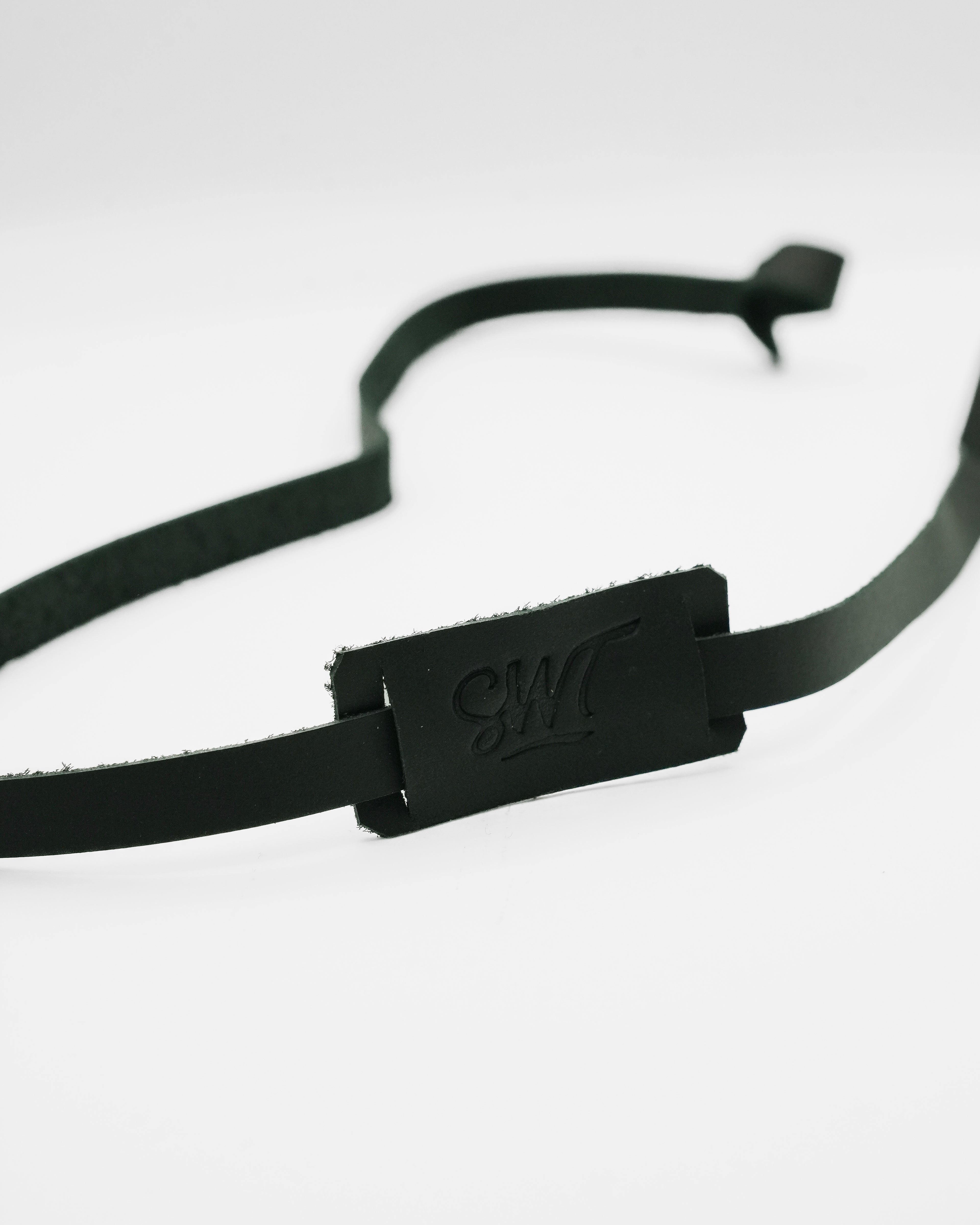 SWT black leather sunglasses strap attached to sunglasses