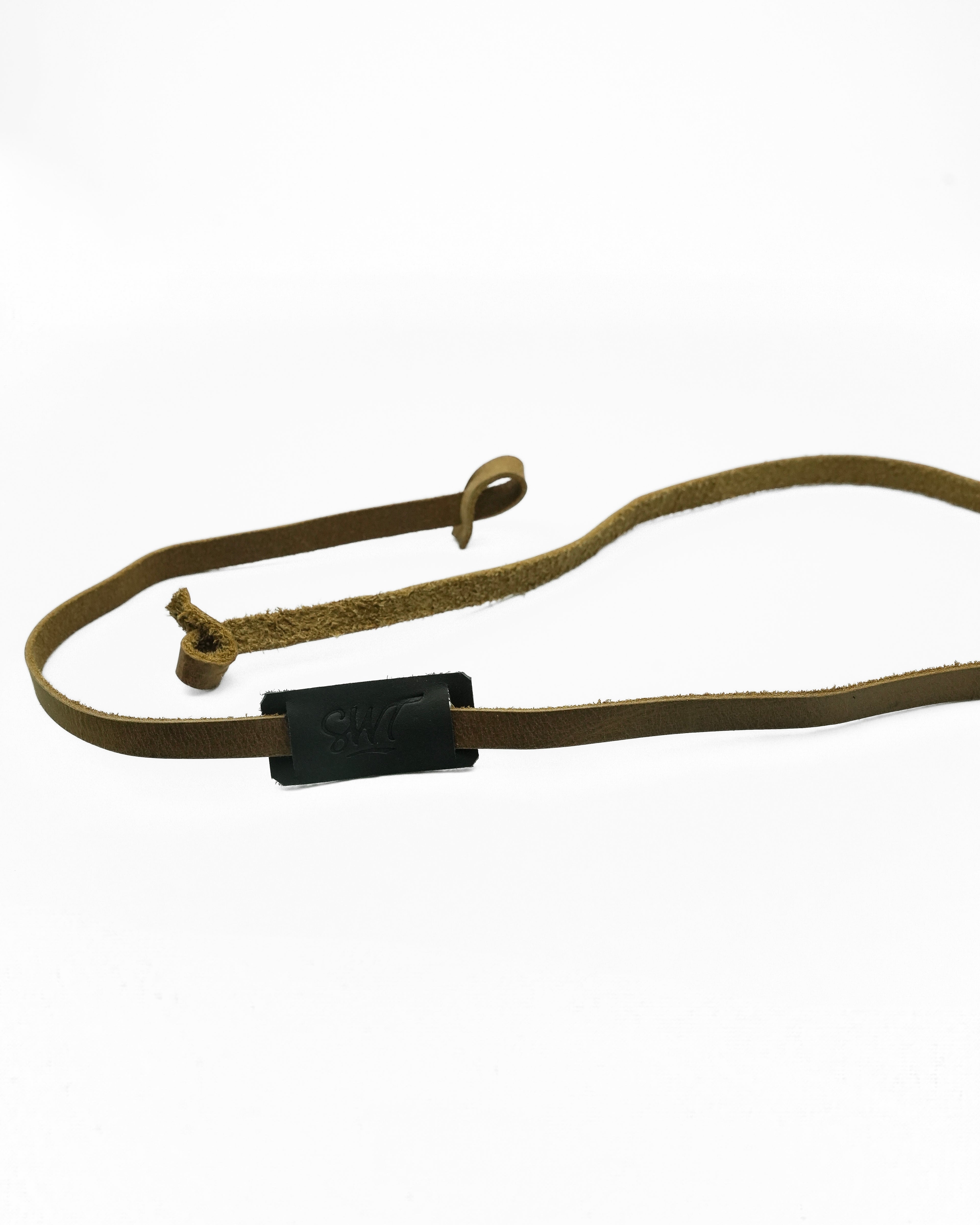 SWT brown and black leather sunglasses strap attached to sunglasses