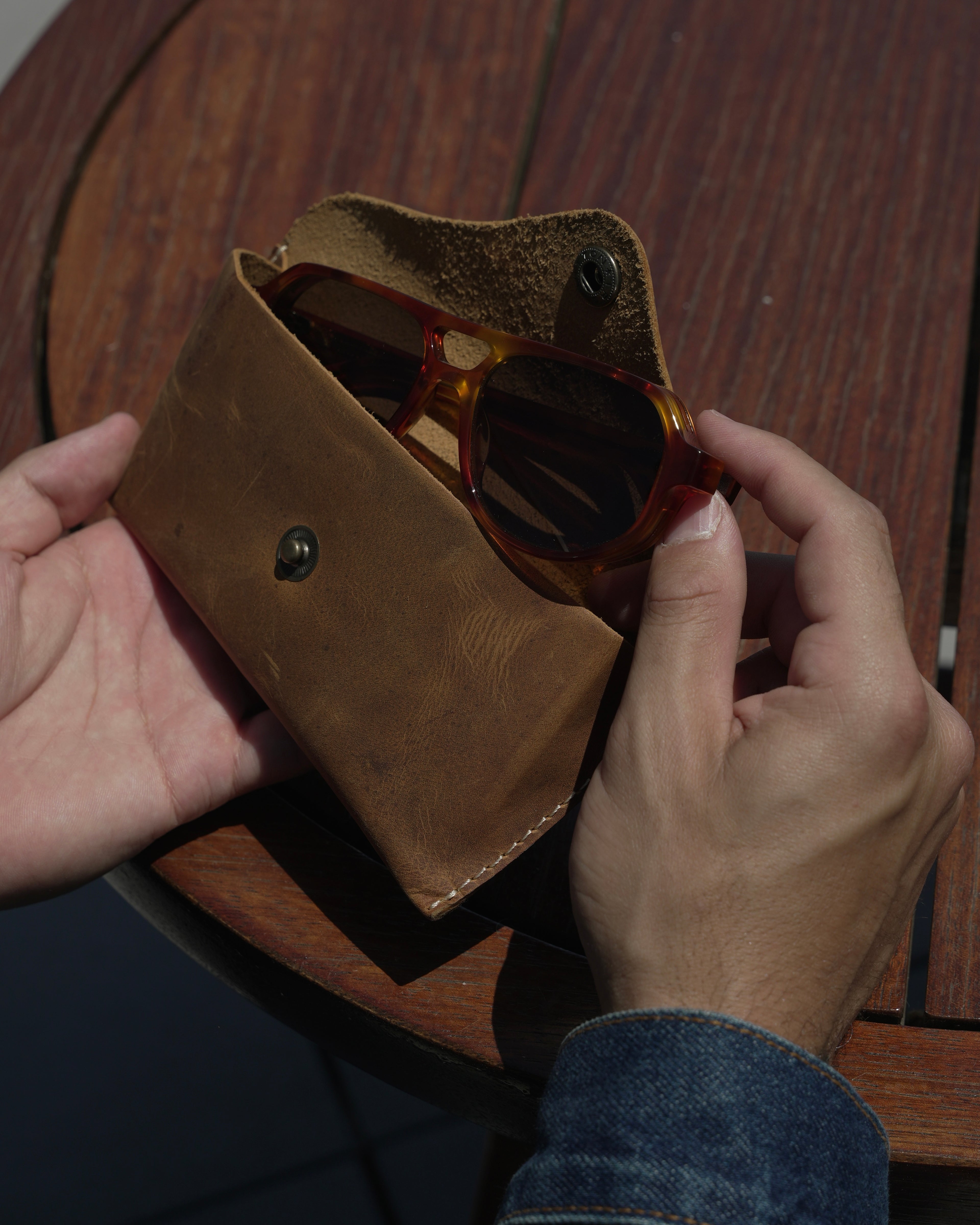 SWT brown leather sunglasses case, oil-waxed finish, side view