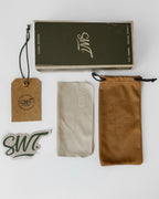SWT packaging: green box, suede pouch, microfibre cloth, sticker and hand-signed approval tag