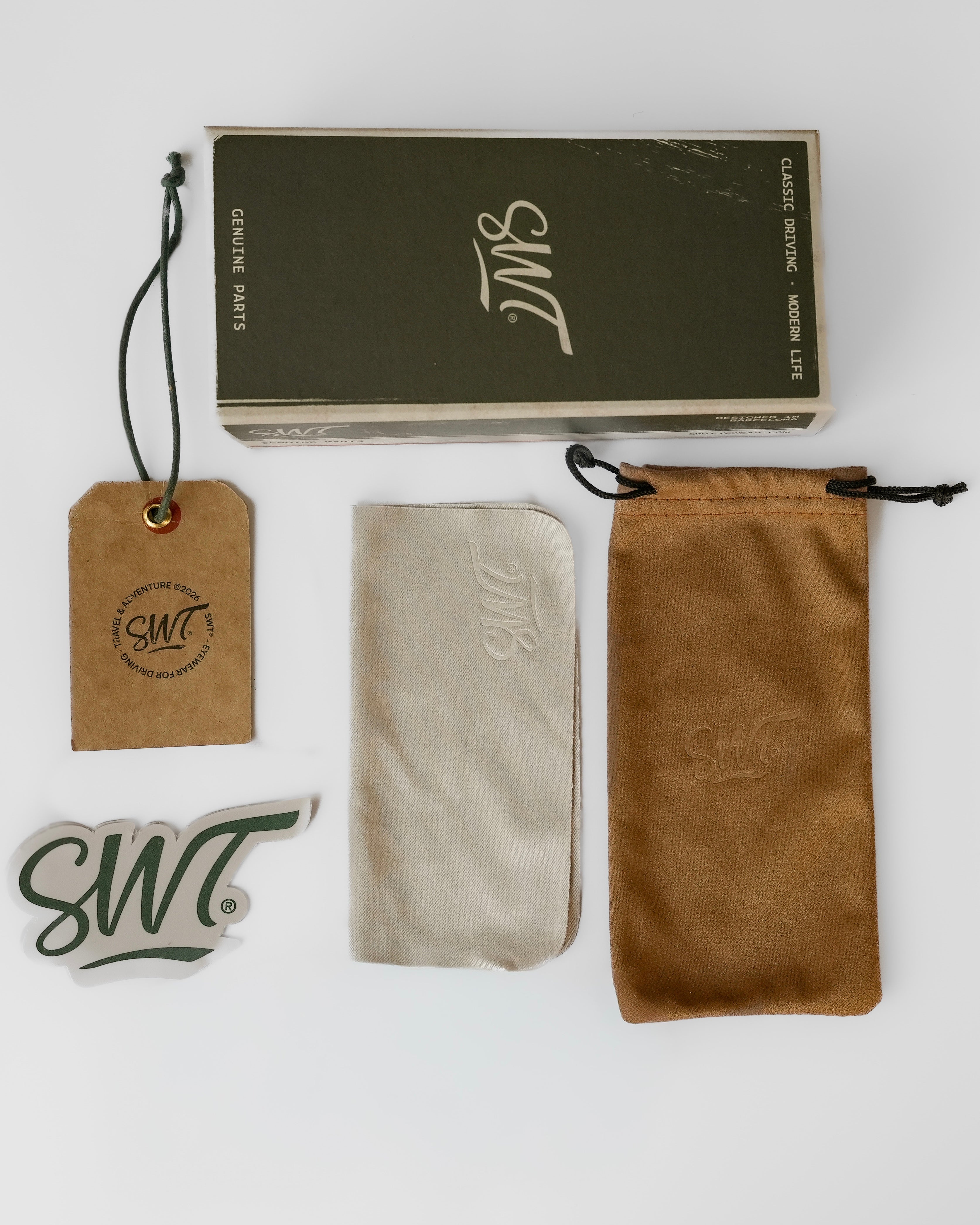 SWT packaging: green box, suede pouch, microfibre cloth, sticker and hand-signed approval tag