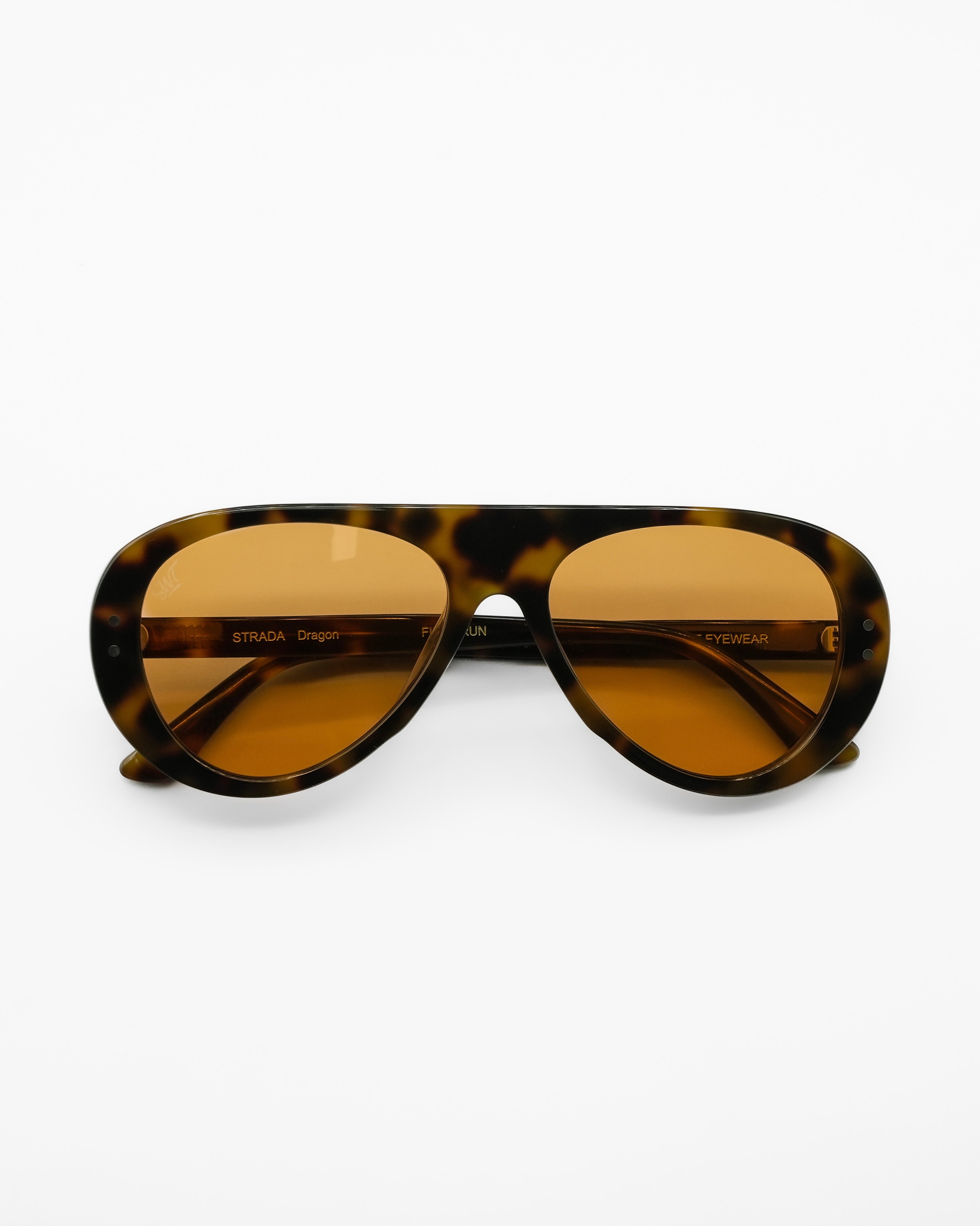 Dragon sunglasses by SWT, dark tortoiseshell aviator frame with warm amber lenses, front view