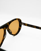 Dragon sunglasses by SWT, dark tortoiseshell aviator with amber lenses, side view showing temple