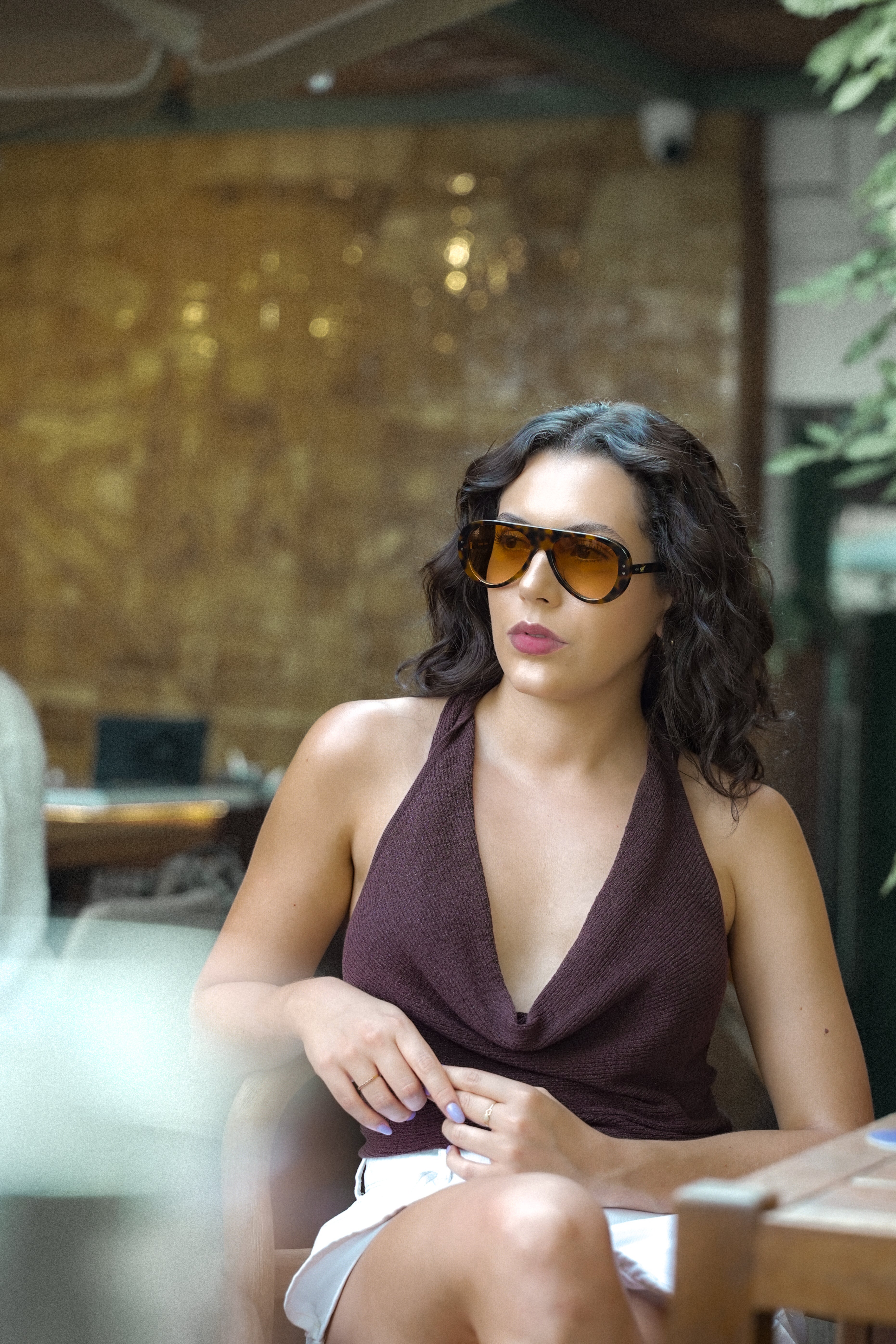 Dragon sunglasses by SWT, dark tortoiseshell aviator with amber lenses, worn view