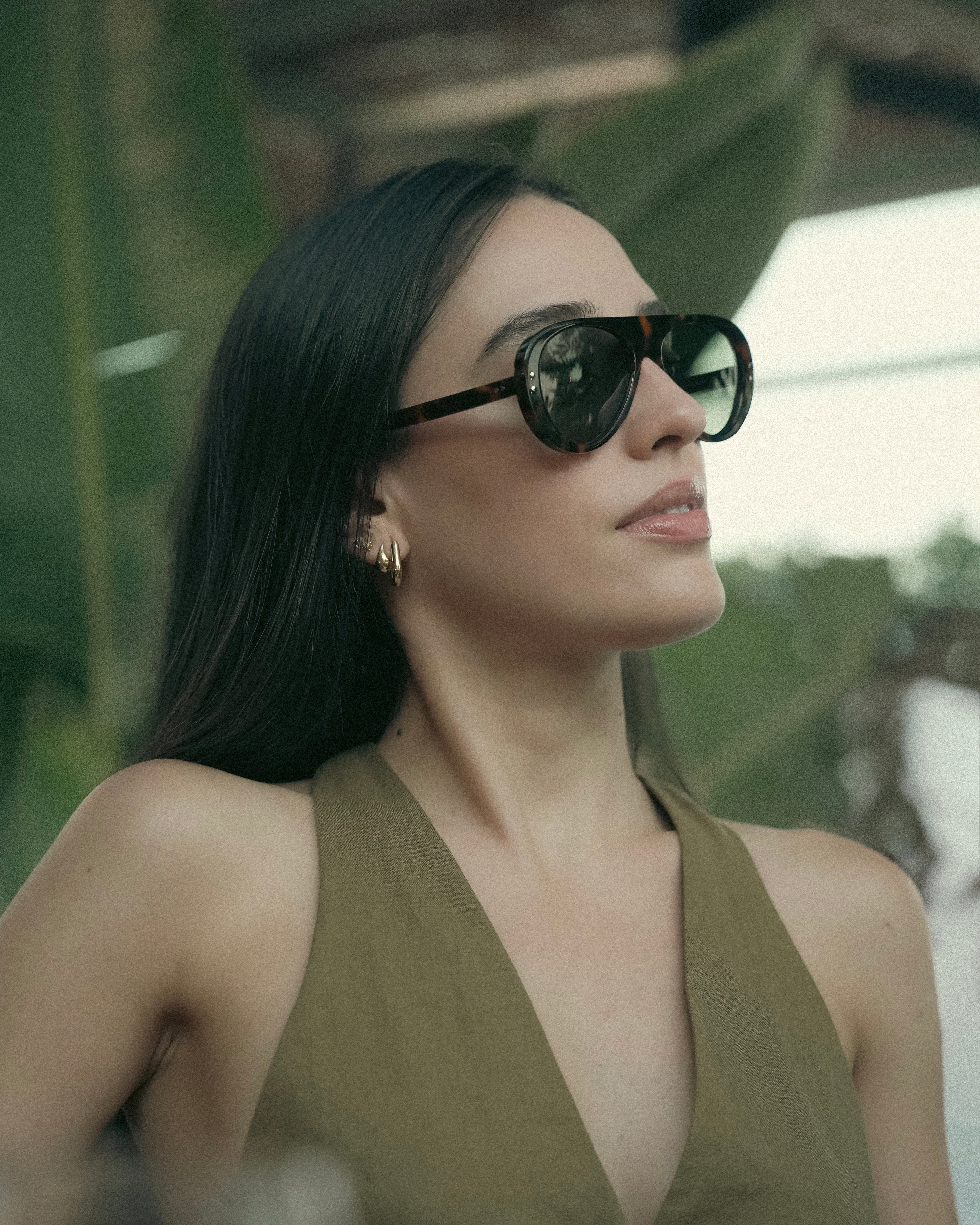 Miglia sunglasses by SWT, close-up of G15 green lens and rivet detail