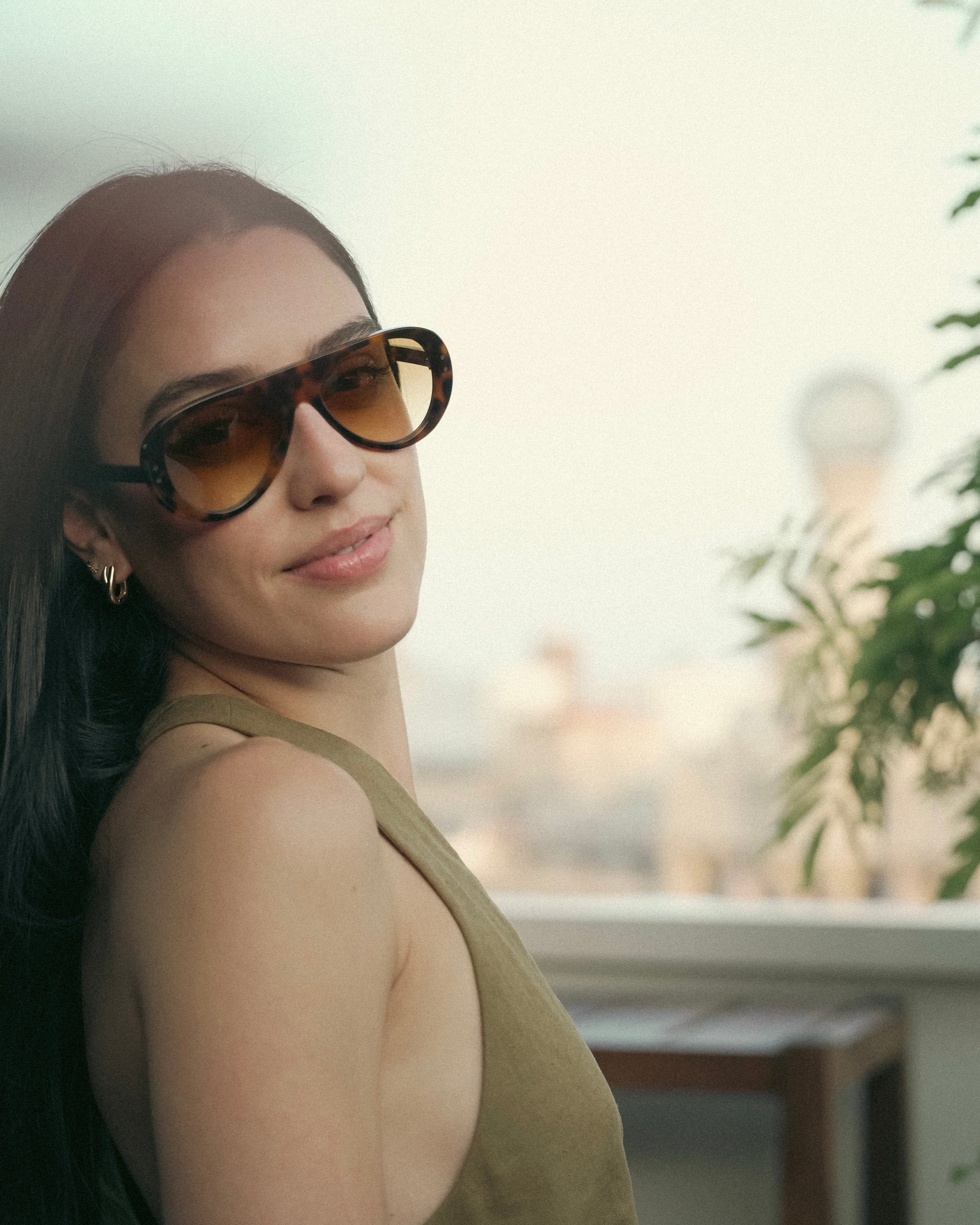 Florio sunglasses by SWT, close-up of tobacco gradient lens and rivet detail