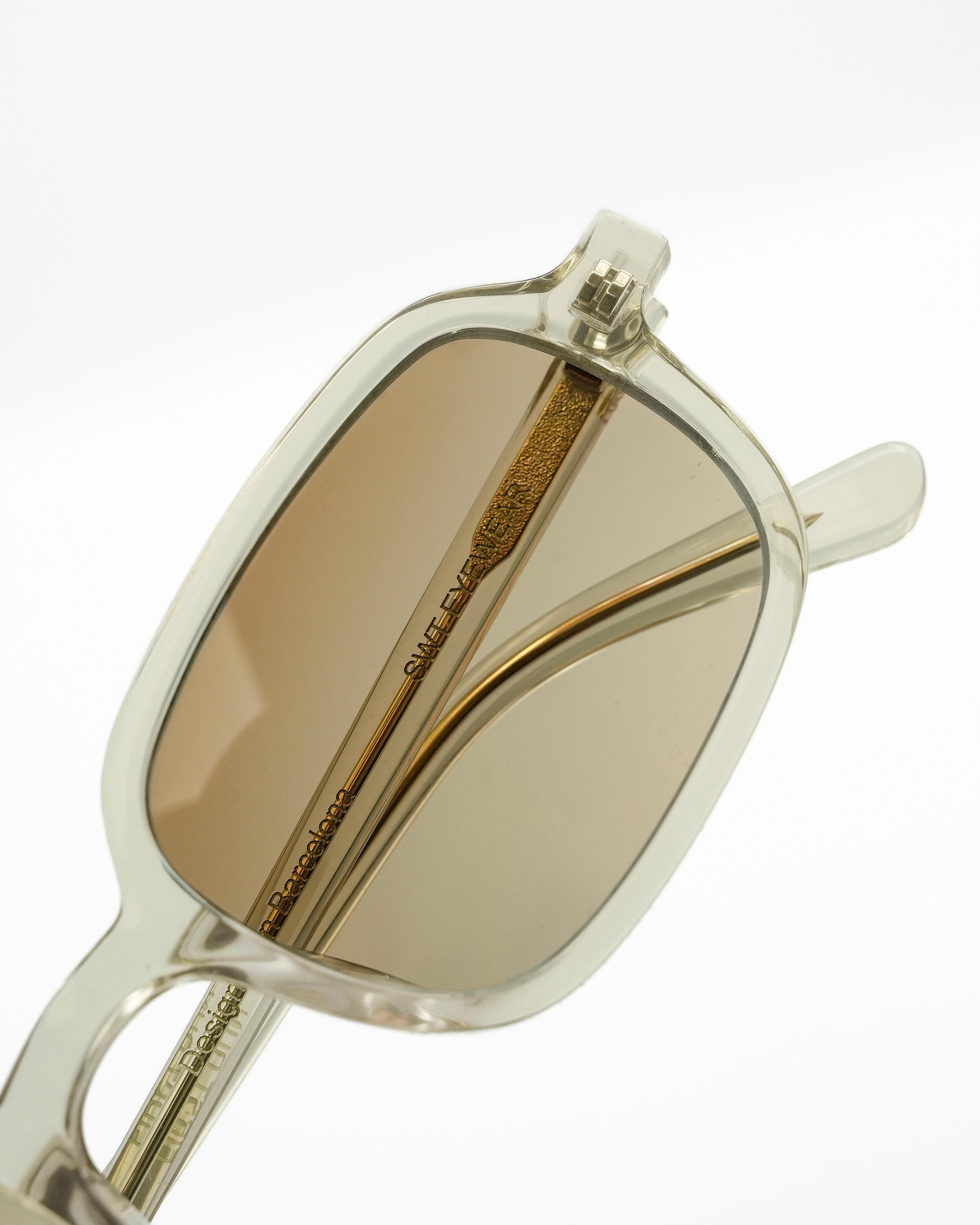 Vesper sunglasses by SWT, transparent amber frame with brown gradient lenses