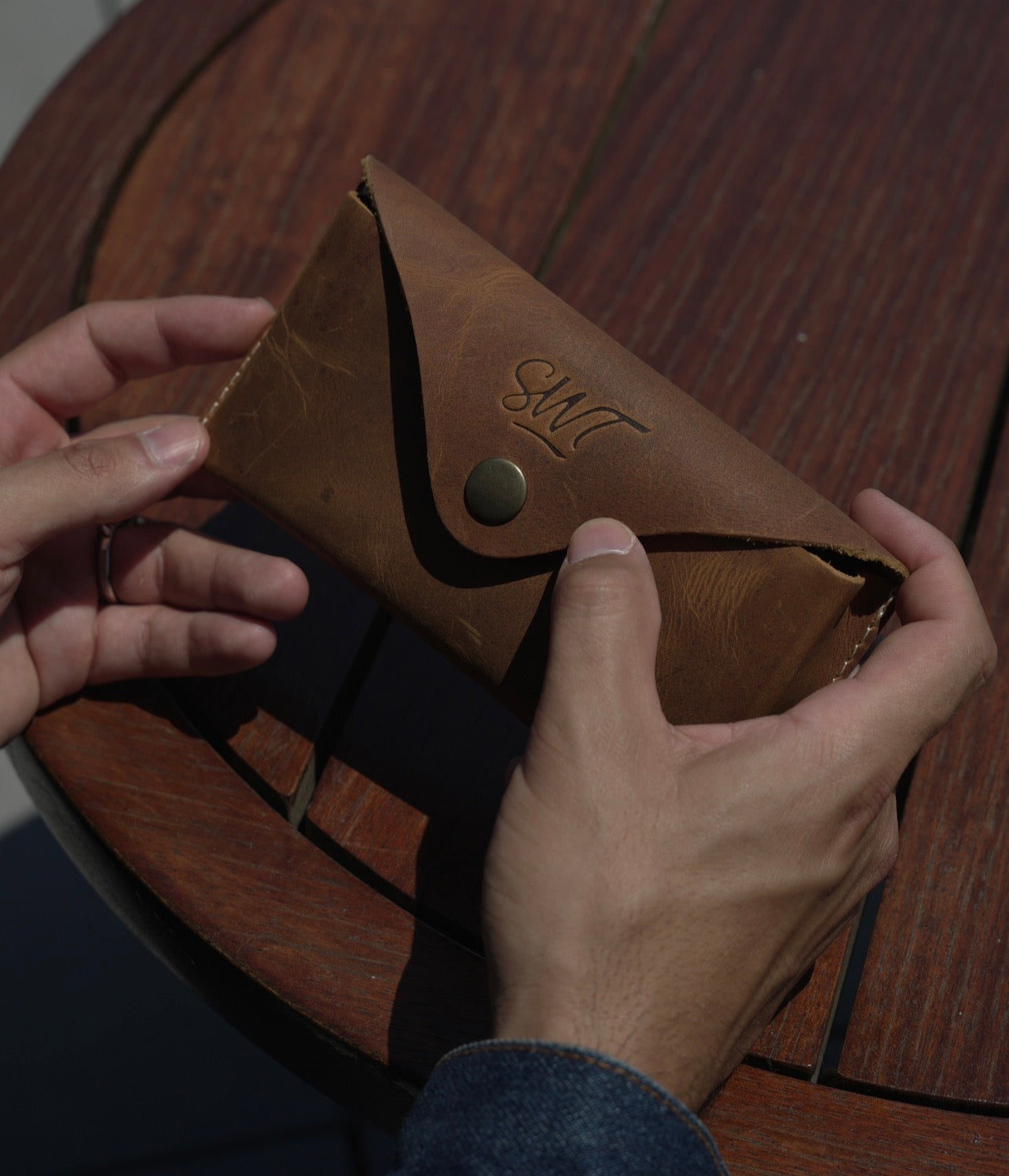 SWT brown leather sunglasses case, hand-stitched edge detail