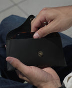SWT black leather sunglasses case, matte finish, side view