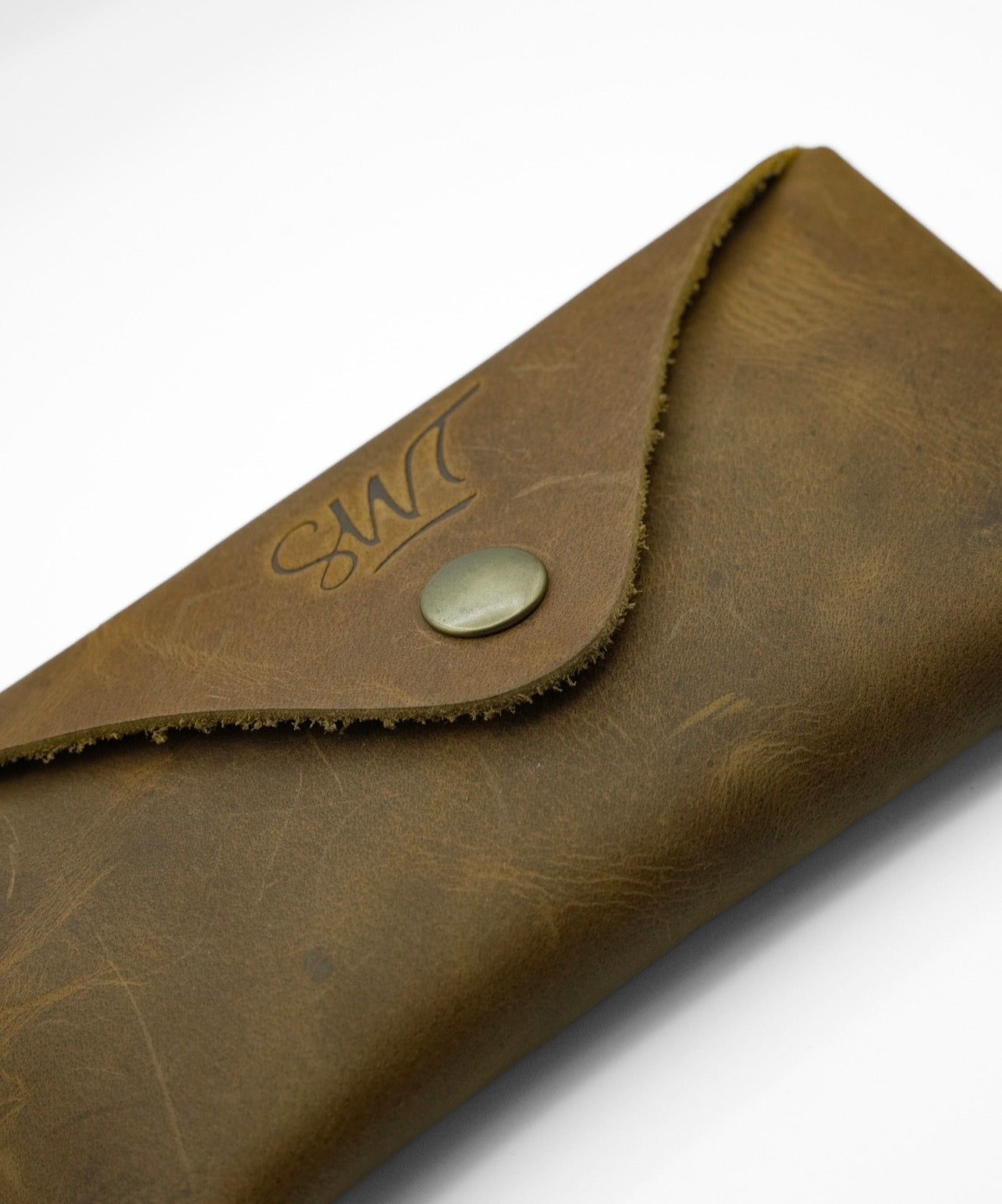 SWT brown leather sunglasses case, open with sunglasses inside