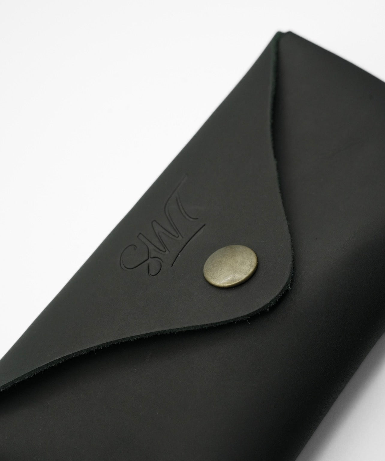 SWT black leather sunglasses case, open with sunglasses inside