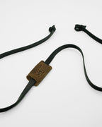SWT black and tan leather sunglasses strap, sliding label detail