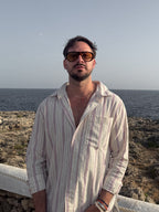 Dragon sunglasses by SWT, dark tortoiseshell aviator with amber lenses, lifestyle view